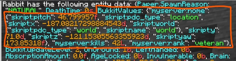 An output of /data get entity, showing BukkitValues with a location, integer, and string stored.