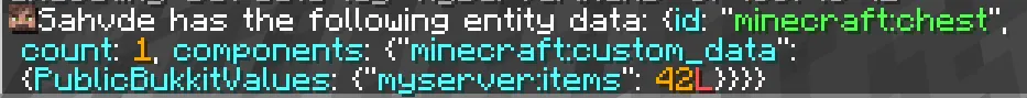 An output of /data get entity @s SelectedItem, showing PublicBukkitValues with an integer stored.